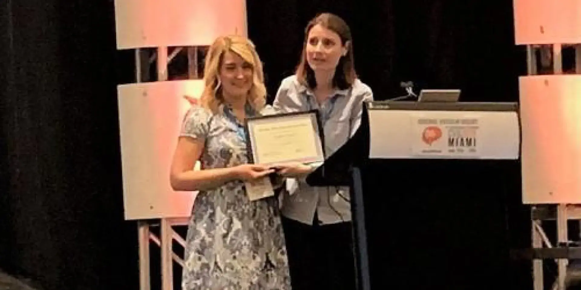 Sophie Quick receiving the award