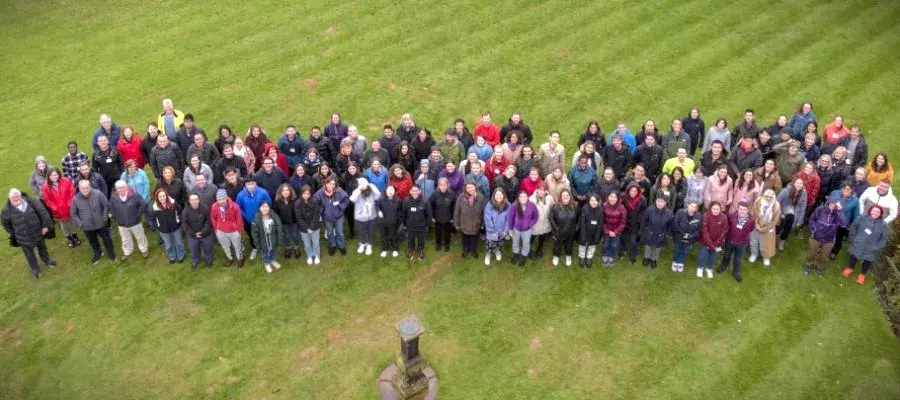 CRM staff and students gathered together for a group photograph